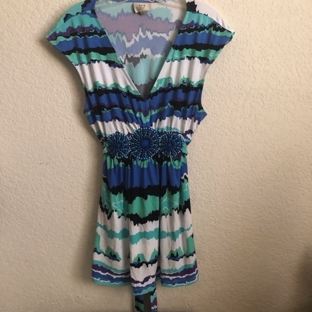 Sleeveless top turquoise blue white color